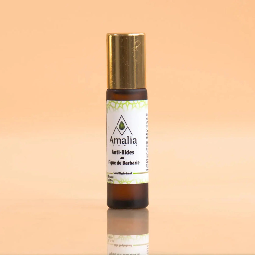 Amalia skincare serum bottle on a gradient background