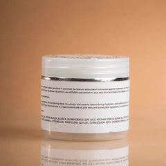 Jar of cream with a label on a beige background
